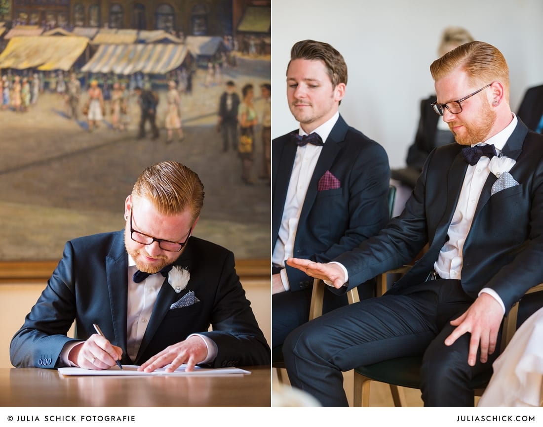 Bräutigam unterschreibt Eheurkunde nach standesamtlicher Trauung im alten Rathaus in Dortmund